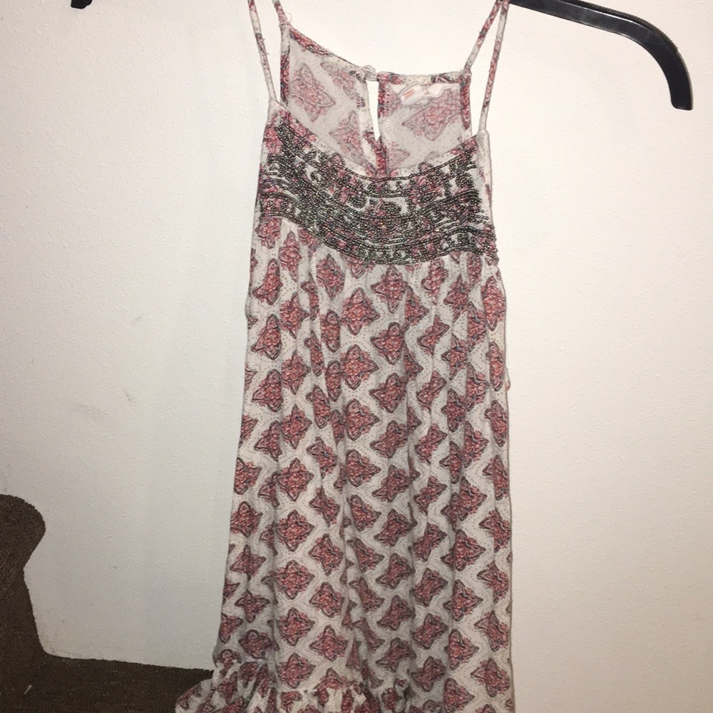 Cute tank with beading!